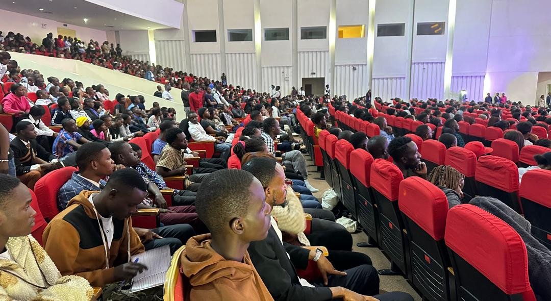 Wide view of a packed auditorium